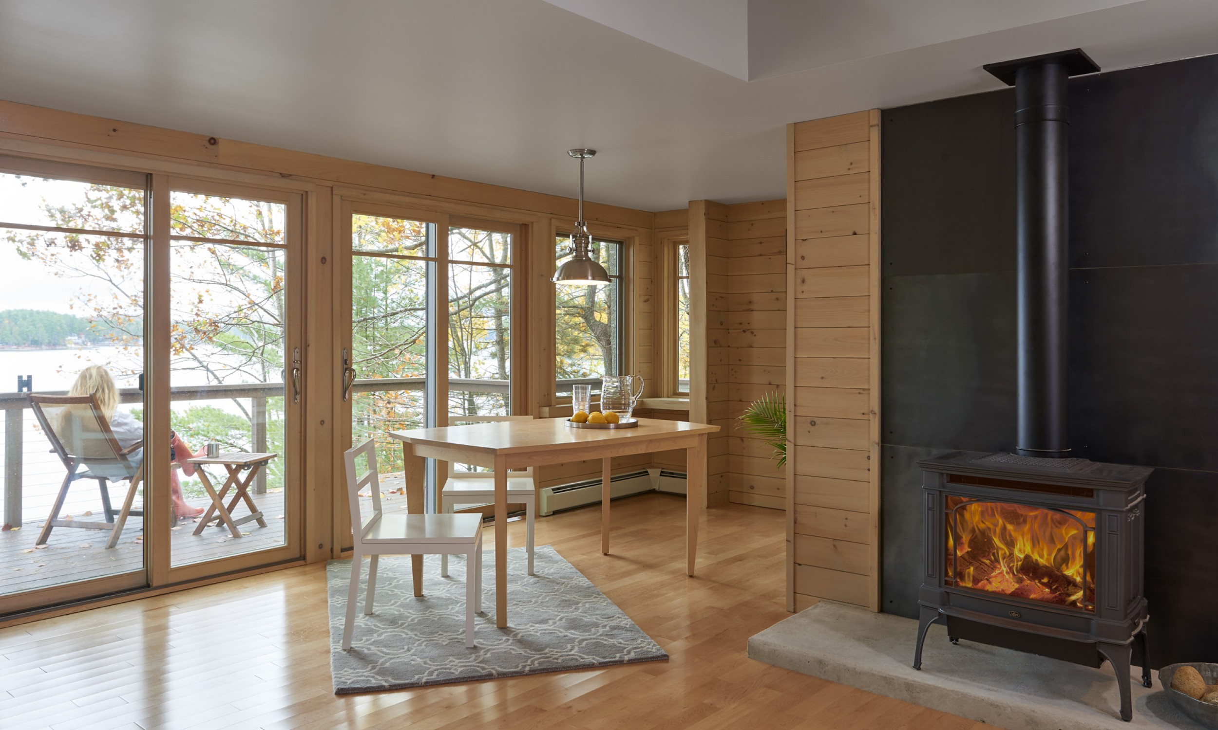 Gas stove, maple flooring, lake view, Maine Architect, Concrete hearth